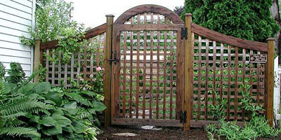 Arched Square Lattice Fencing by Elyria Fence