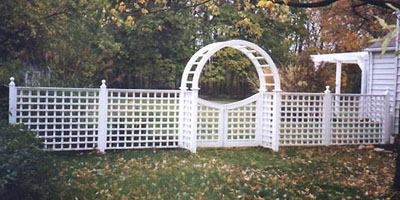 Cedar lattice fence by Elyria Fence