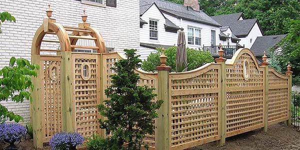 Good Neighbor Arched Square Lattice Fence Designs by Elyria Fence.
