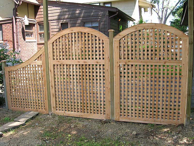 wood arched square lattice by Elyria Fence