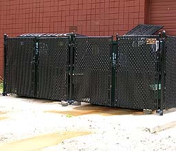Black Vinyl Coated Chain Link Fence and Dumpster Gate by elyria fence