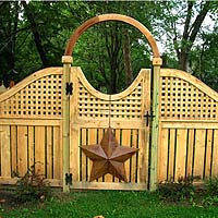 Arched square lattice with semi private wood fence by Elyria Fence